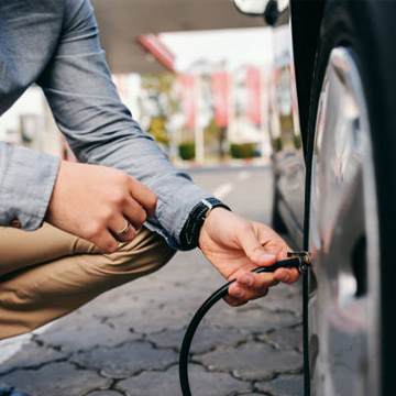 inflating car tyre