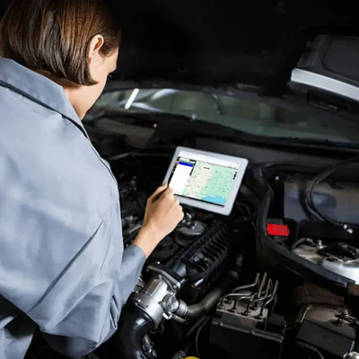 Mechanic diagnosing stability control electrical issue with scan tool