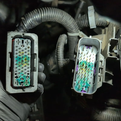 Signs of Corroded or Damaged Car Wiring - Corroded wiring connectors